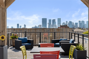 Spectacular rooftop patio with bbq stations, firepits, stylish furniture